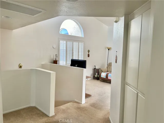 Go up the stairs to the main living space