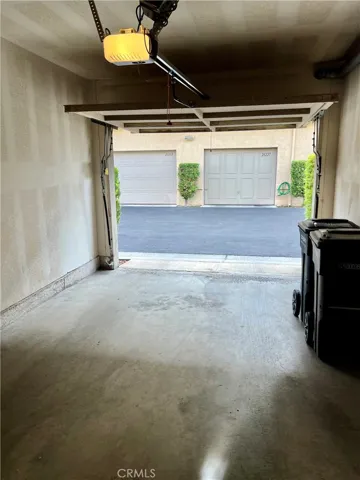 Garage door opener with two remotes
