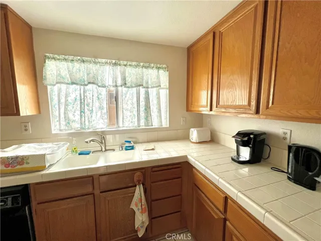Kitchen is light and bright. Window in kitchen