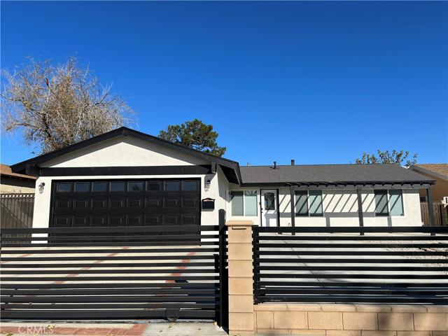Front exterior with automatic gate entry.