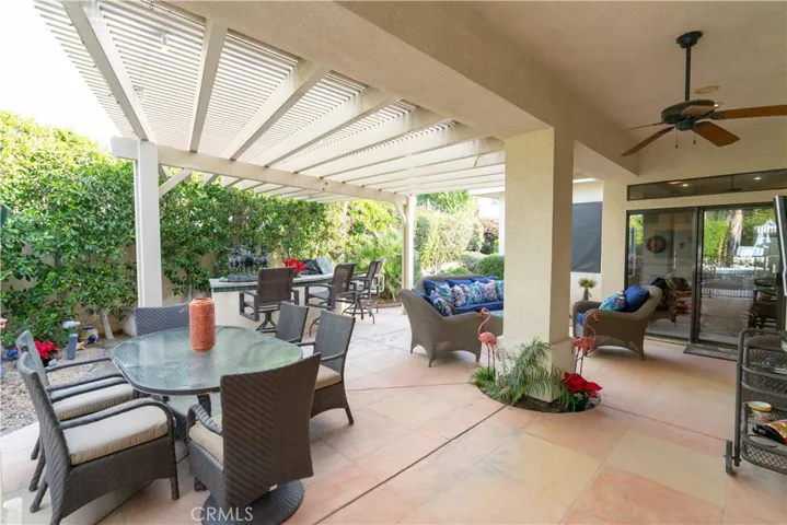Just outside the master bedroom and the living area of the home is a large covered patio