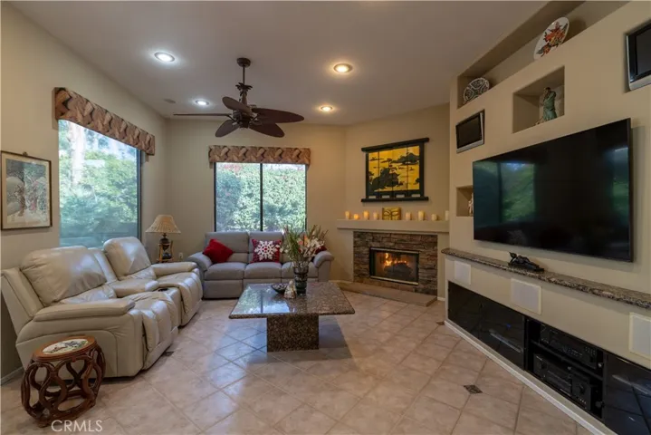 The family room has a custom built wall for your tv and to house all your audio video components