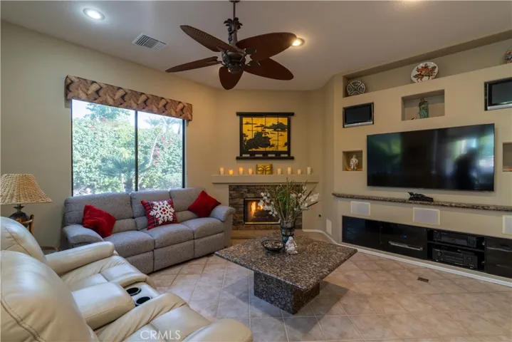 The beautiful rock fireplace in the corner has gas logs and provides extra warmth in the family room