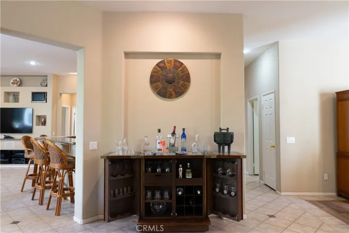 From the living room, you have easy access to the family room, kitchen, and two bedrooms on the front of the home