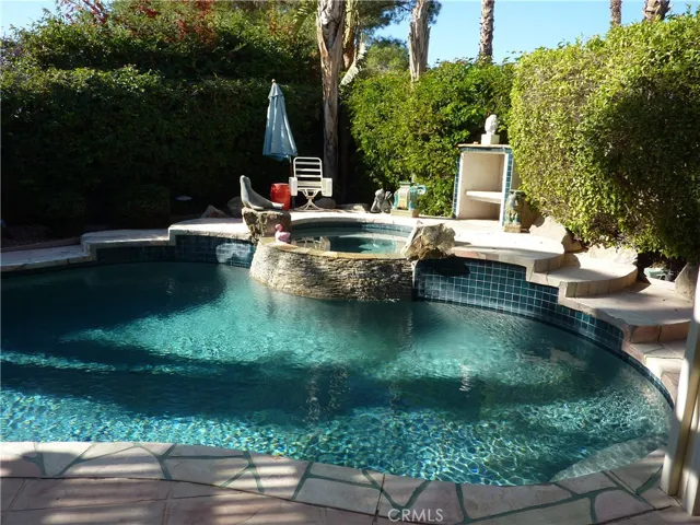 As you enter the gated pool/spa area of the home, you feel like you're in your own shangri-la.