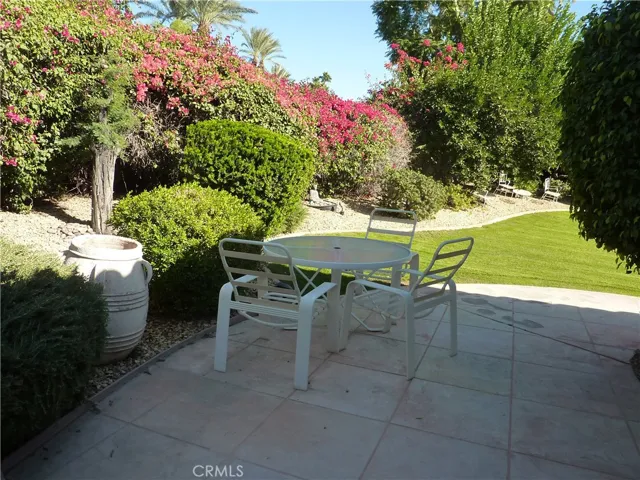 Outside the back bedroom is another small patio area that's the perfect place to enjoy the morning sun.
