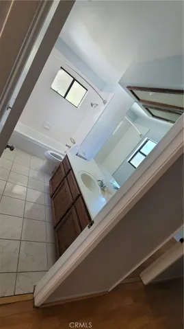 guest bathroom and shoer nice tile with open space