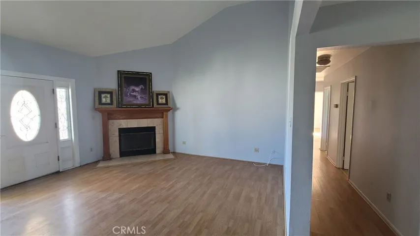 family room and hallway leading to bedrooms