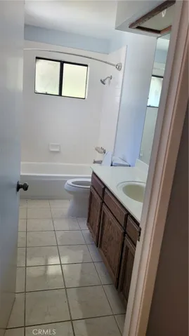 guest bathroom and shower area with bathtub