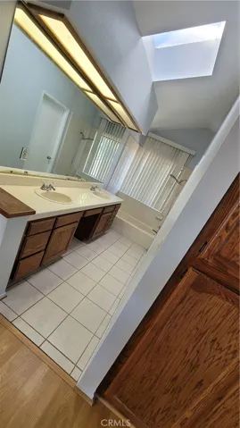 Masterbedroom vanity area with bath tub
