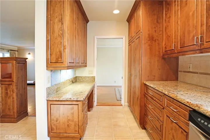 Work space in kitchen leading into family room.