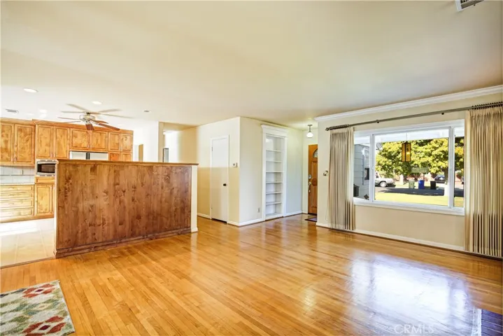 Living room facing front door entry.