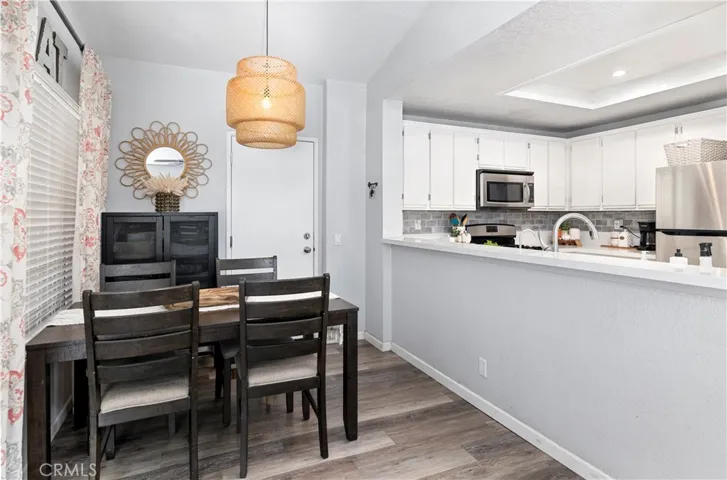 Dining room and door access that leads to the garage.