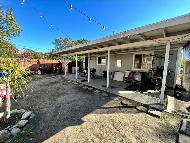 View of back unit with private yard