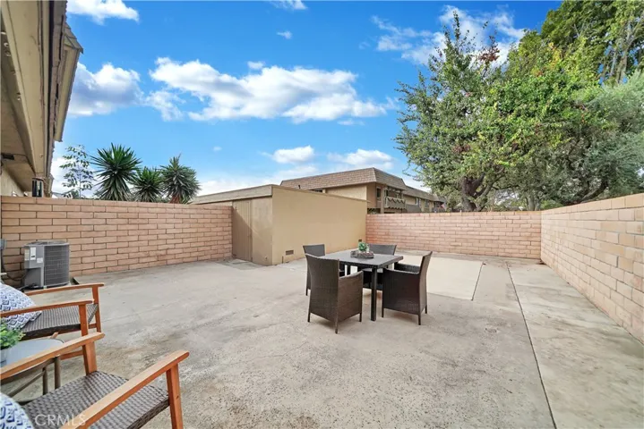 This is a Rare Unit in that Most of the Homes in this Community do not have Patios the Size of this One. Private, Huge, Direct Access to the 2 Car Garage, this is all Ready for Major Entertaining!