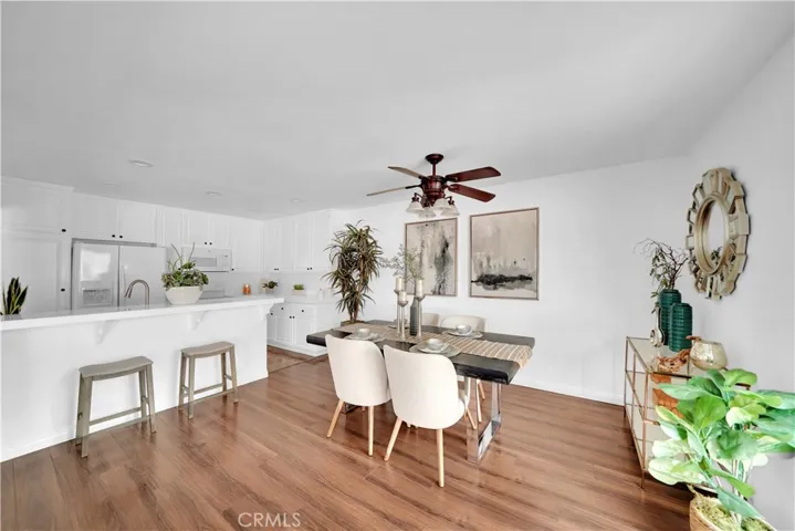 Large formal dining Room is Open to the Upgraded Kitchen with Breakfast Bar