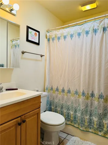 Full bathroom in hallway.