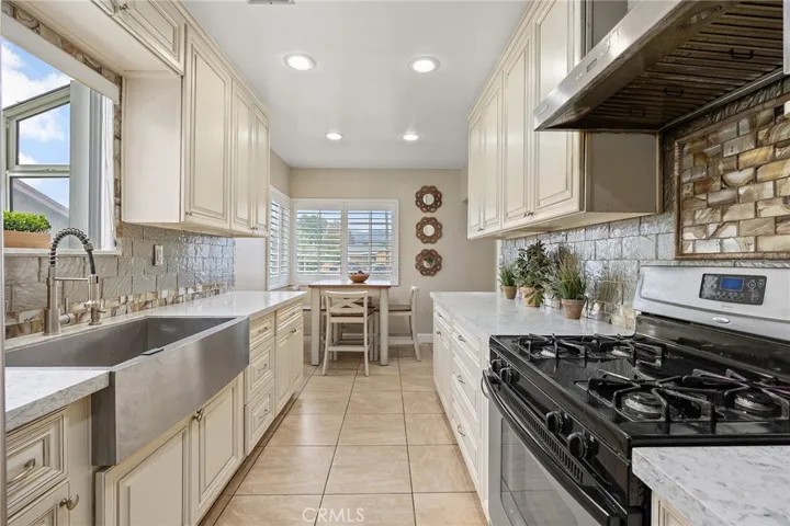 Updated Kitchen with Custom Backsplash