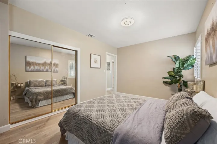 Primary Bedroom with Mirrored Closet