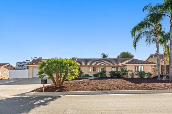 This enchanting home sits well back from the street