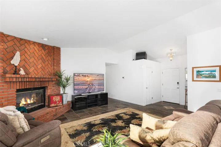 Gorgeous floor to ceiling masonry fireplace