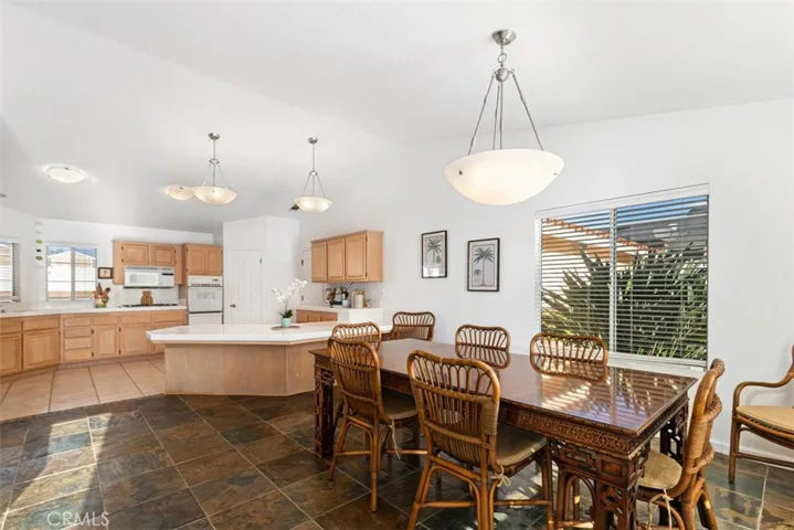 Spacious kitchen flows into dining area