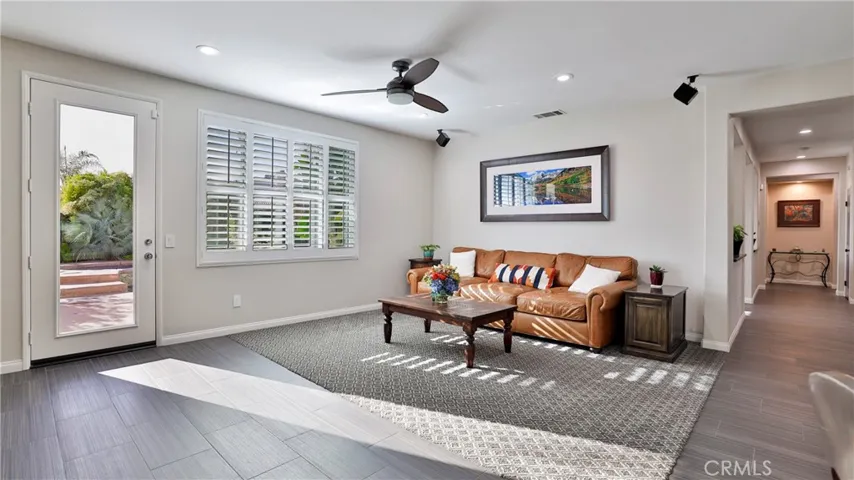 At the end of the hall (right side of photo) is a full bath and bedroom as well as a door to the single car garage.  The layout allows for privacy for guests, extended family or the person on a different schedule.