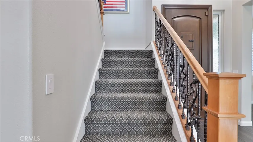 Notice the custom ironwork on the staircase!