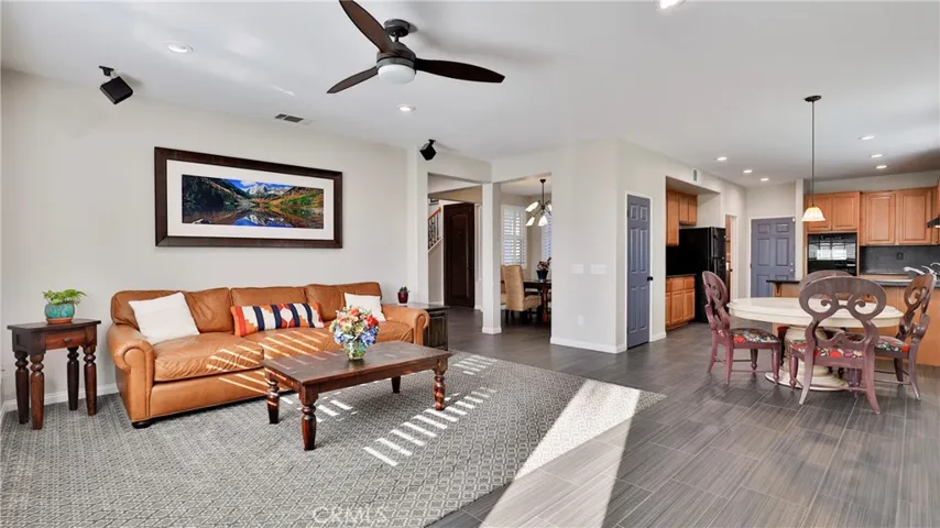 Relax in the spacious family room while watching your favorite movie, complete with built-in surround sound.  Warmed by the fire with the smell of a home cooked meal, this is the place you call your own.