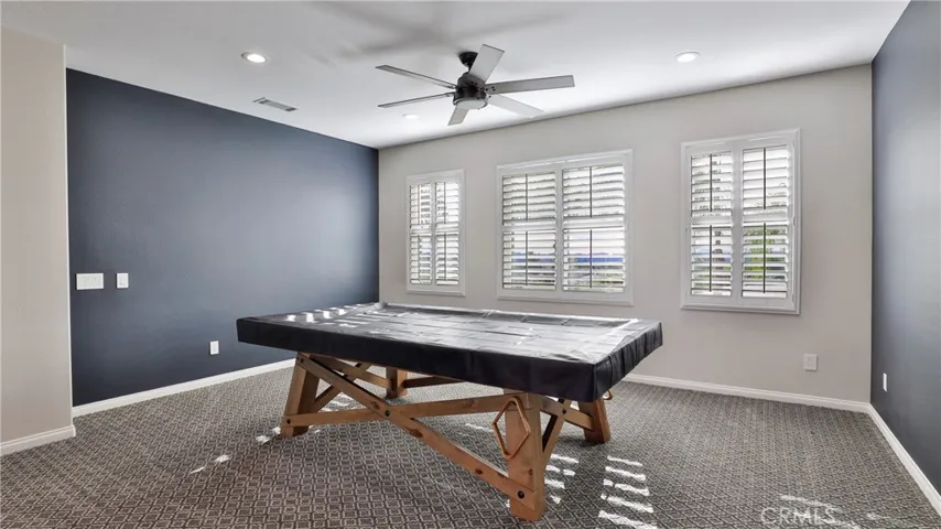The upstairs loft makes a perfect game room, fitness center or homework/study area.
