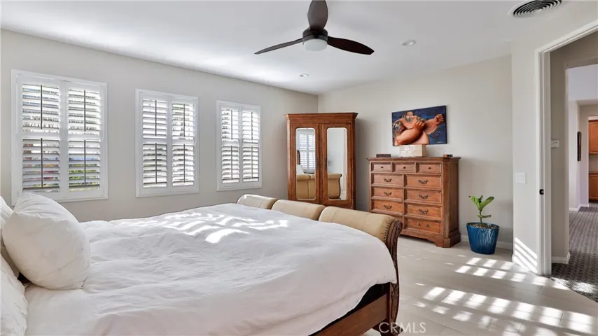 A peaceful respite at the days end.  Natural light spills through the new low e windows.  Plantation shutters allow you to block the light for those lazy Sunday mornings.