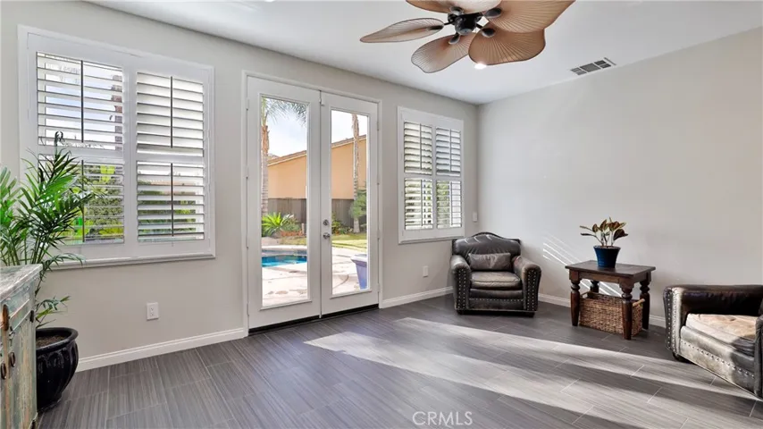 New floor tile, new paint, new windows are yours to enjoy!  Notice the ceiling fans throughout the home?