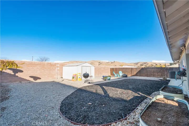 Back yard with low maintenance landscape
