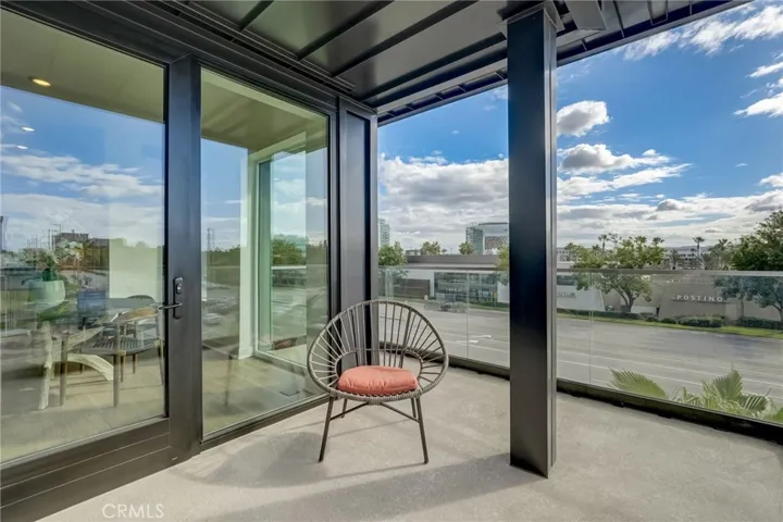 Private balcony where you can enjoy mountain and city views and palm trees!