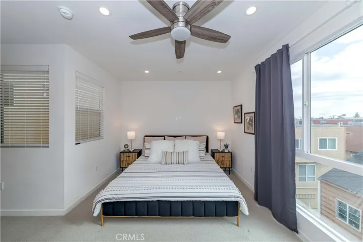 Primary bedroom with city views.