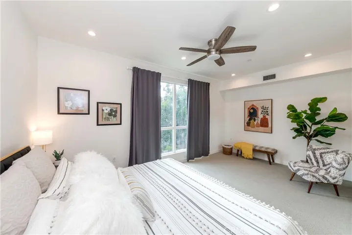 Primary bedroom with city views.