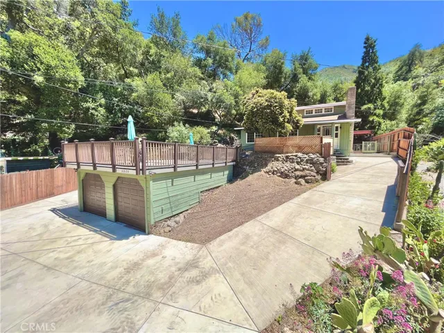 Detached 2-Car Garage w/ Large Driveway Able to Accommodate 5+ Additional Cars.