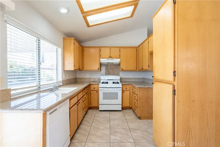 Kitchen with Granite Countertops and Pantry