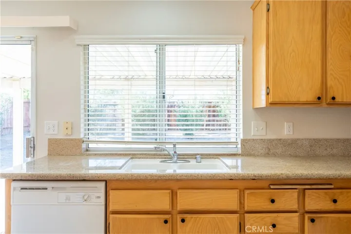 Kitchen with Granite Countertops and Pantry