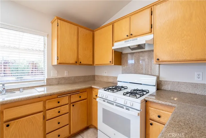 Kitchen with Granite Countertops and Pantry