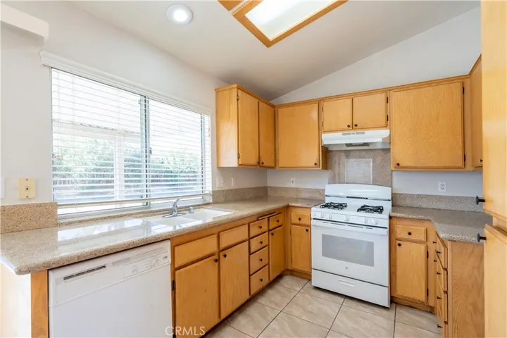 Kitchen with Granite Countertops and Pantry