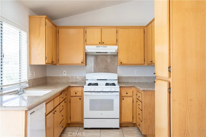 Kitchen with Granite Countertops and Pantry