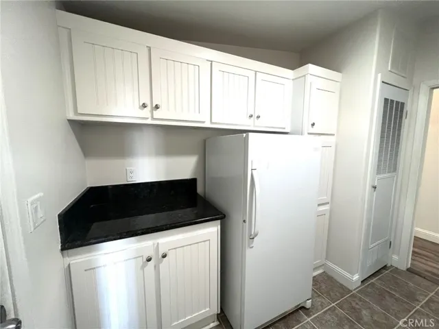 Laundry with storage, folding area and freezer