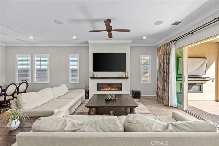 Warm and inviting family room with indoor/outdoor living.