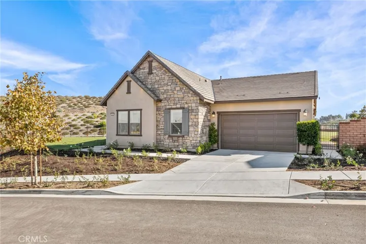 New tastefully landscaped yard on over a half-acre flat lot.  Beautiful stonework, along with fresh exterior paint and stucco.