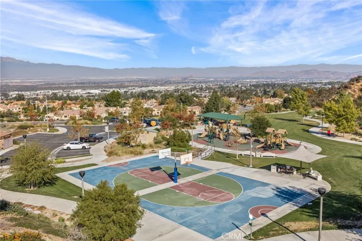 Sierra Bella Park with playground, picnic area, and sport court