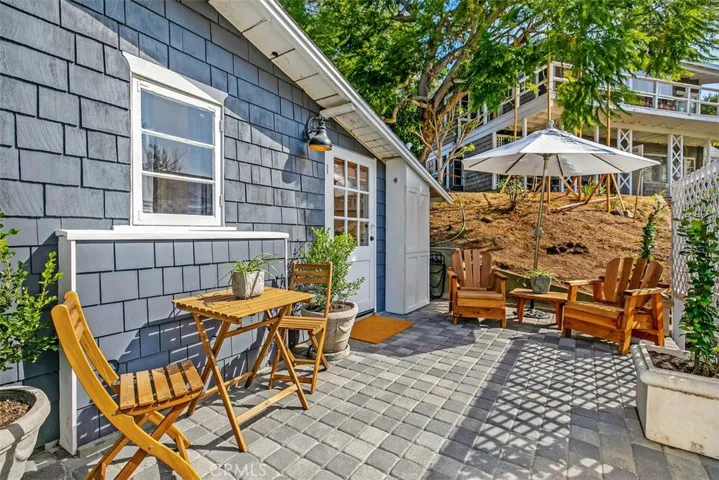 Side patio to use for entertaining or relaxing.