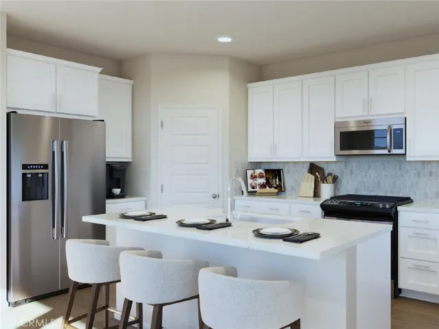 Photo is not of the actual home, but is an inspirational photo of builder’s model home and may depict options, furnishings, and/or decorator features that are not included