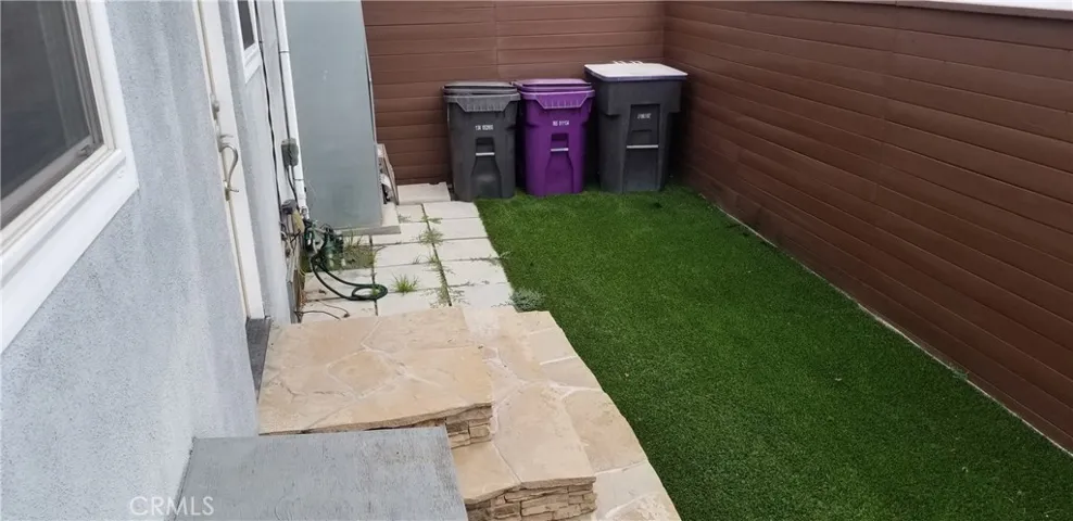 nice gated yard w/two entryways to home