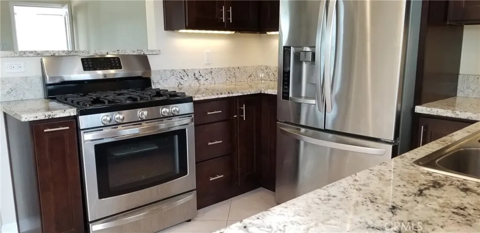 cooktop and refer from slider to back yard